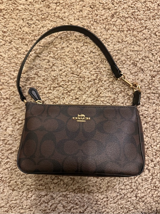 Coach Handbags - Coach Dark Brown Signature Canvas Shoulder Bag with Black Strap